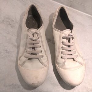 Clark’s white leather lace up sneakers.  Great used condition!